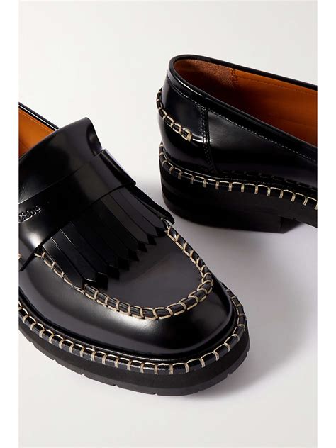 CHLOÉ Noua fringed whipstitched leather loafers.